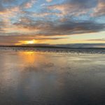 An autumnal sunset on a beach in Wexford