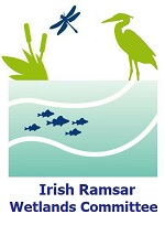 Irish Ramsar Wetlands Committee logo with cattails, a dragonfly, a heron, and fish beneath stylised water.”